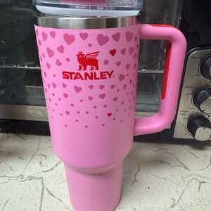 Stanley Pink Travel Mug with Red Logo and Heart Pattern
